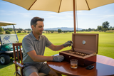 a person using this humidor at the golf course